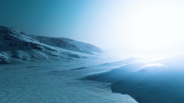 Snowed Mountains in Alaska with Fog