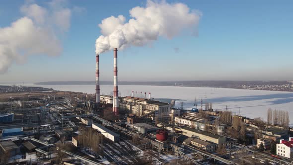 Aerial view of industrial zone with factory emission of carbon gas and smoke