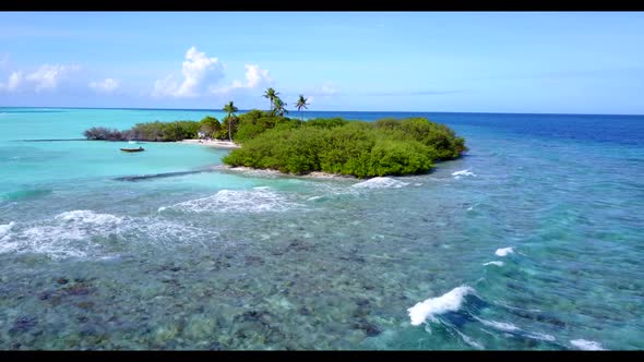 Aerial seascape of beautiful seashore beach trip by turquoise lagoon with clean sand background of j