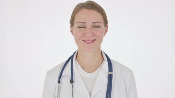 Female Doctor Smiling at Camera on White Background