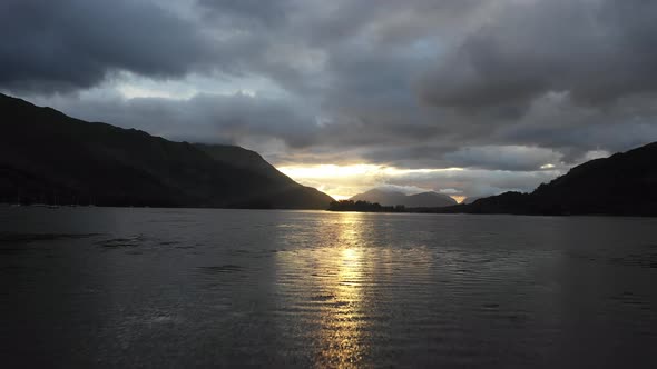 Aerial drone view of Loch Leven in Scotland at sunset