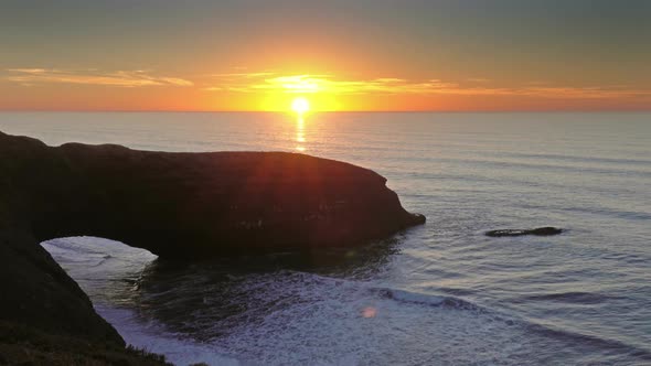 Legzira Beach with Arched Rocks at Sunset