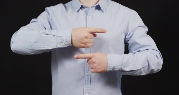 Man pointing in both directions alt