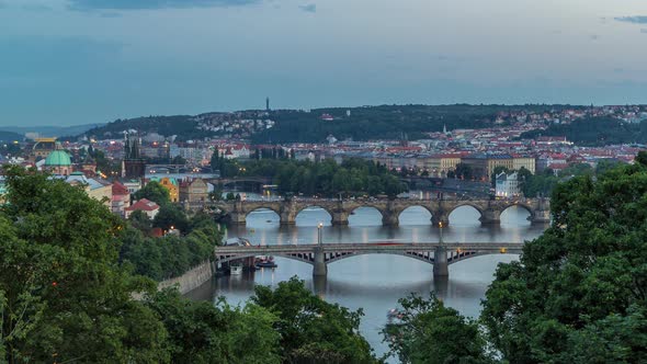 Scenic View of Bridges on the Vltava River Day to Night Timelapse and of the Historical Center of