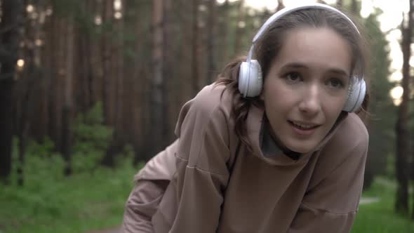 A Girl is Resting After a Jog