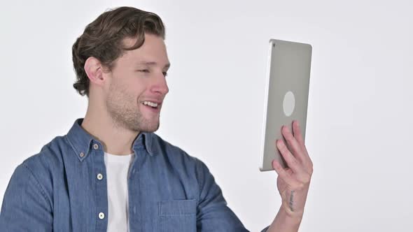 Online Video Chat on Tablet By Young Man on White Background