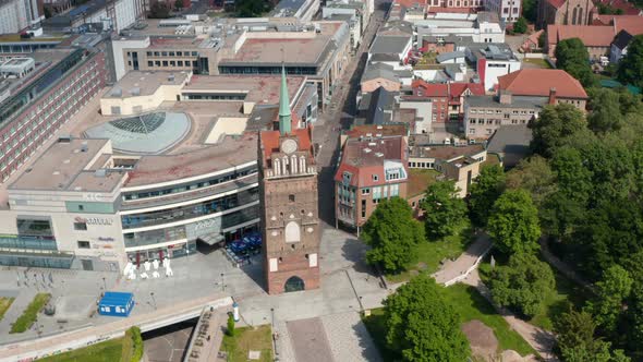 Aerial View of Historic Town Gate Kropeliner Tor Next to Modern Building of Shopping Centre