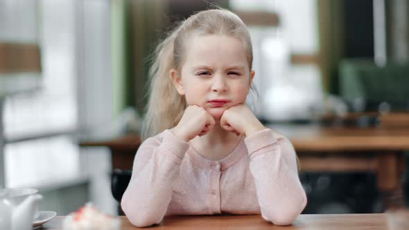 Portrait Frowning Female Kid Posing Showing Angry Grumpy Face