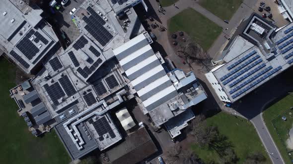 Birds-Eye-View Solar Panels On Top Of Industrial Buildings Aerial Overhead