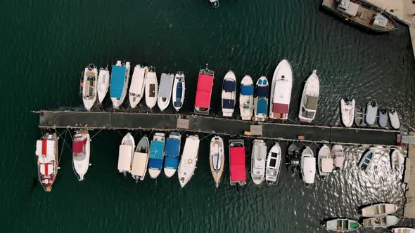 Top down view of marina harbor many colorful boats authentic ships fishing boats