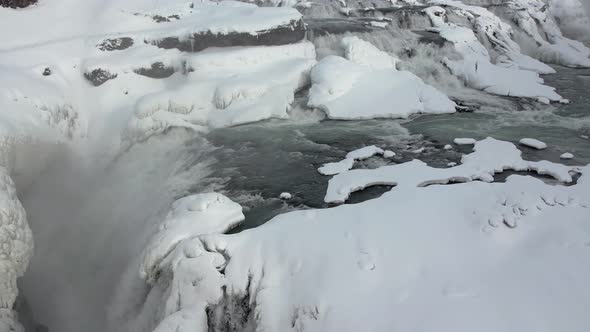 Aerial view of Seljalandsfoss waterfall in wintertime in Iceland.