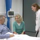 Female doctor talking with patient and his wife - VideoHive Item for Sale