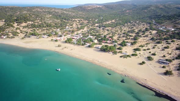 Aerial footage of beach on beautiful Gavdos island, Agios Ioannis beach, Greece.