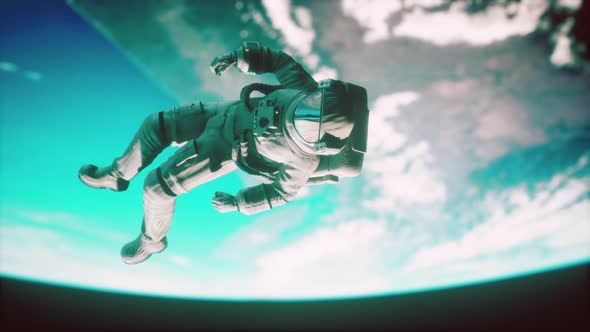Dead Astronaut Leaving Earth Orbit Elements of This Image Furnished By NASA