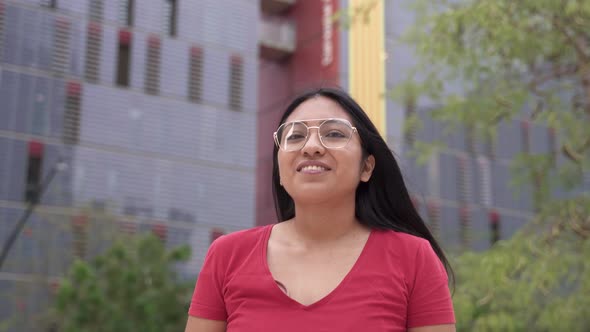 Confident Hispanic Latin American Young Woman Walking the City