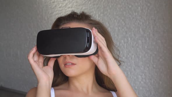 Woman in Lingerie Uses Virtual Reality Glasses
