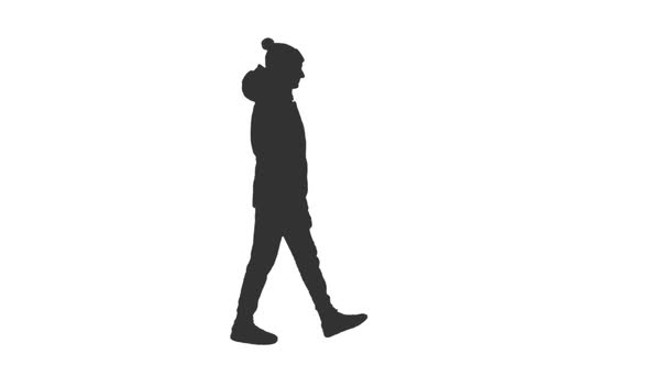 Silhouette of a Woman in a Jacket with a Hood Walks in the Street, Alpha Channel