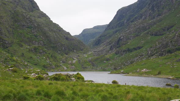 Black Lake At The Head Of The Gap Of Dunloe In County Kerry, Ireland. wide shot