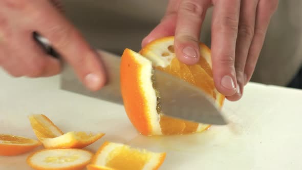 Hands Peeling Orange.