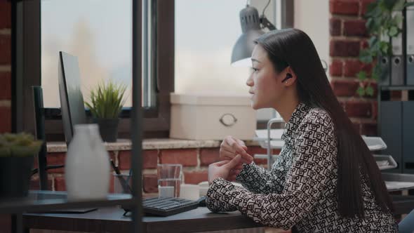 Employee Talking to Colleague on Online Video Call