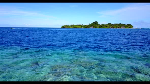 Aerial landscape of idyllic coastline beach time by blue green lagoon with clean sand background of 