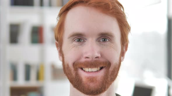 Smiling Face of Casual Redhead Man