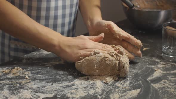 Hands of Ginseng Chefs Prepare Dough for Baking Uses Grey Flour