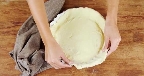 Woman preparing fruit tart 4k