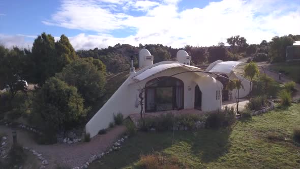Rising Dolly Out Aerial Over Charming Las Nubes Hotel Spa Luxurious Bioclimatic Adobe Holiday Home -