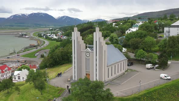 Iceland Lutheran Church of Akureyi with drone video moving out.
