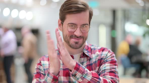Portrait of Excited Male Designer Clapping, Applauding 