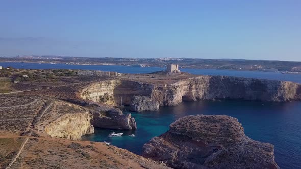 The Blue Lagoon Malta is a small lagoon with relatively shallow, crystal clear water that’s located