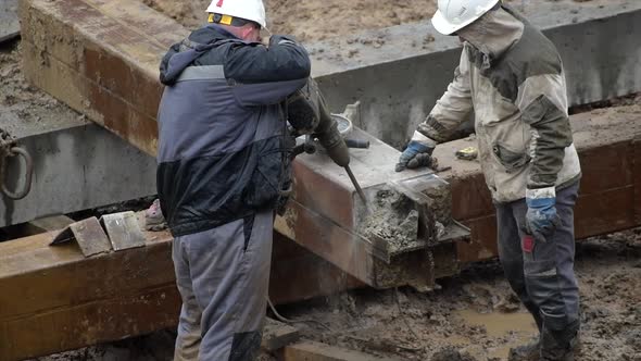 Angular Saw Grinding Through Construction Piles at Construction Site