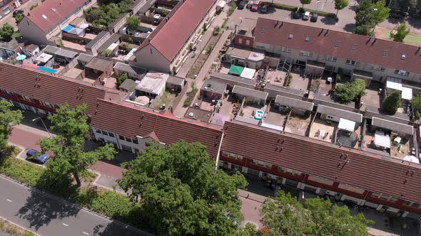 Aerial birds eye overhead of a dutch neighborhood with terraced housing and big adjacent gardens