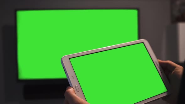 Green Screen Tablet Close Up and Watching Television Green Screen. 