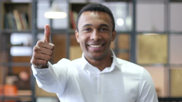 Thumbs Up by Black Man