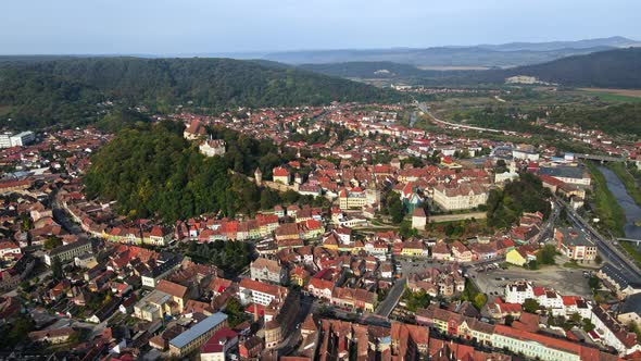 Aerial drone view of the Historic Centre of Sighisoara, Romania. Old buildings