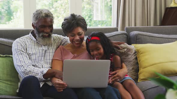 Grandparents and granddaughter spending time together