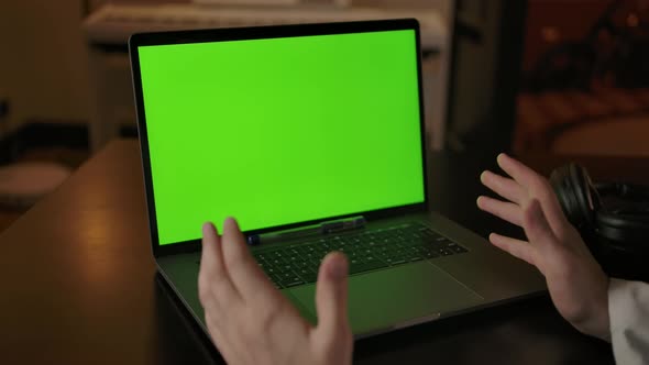 Backview of Caucasian Doctor in Glasses Explaining Diagnosis Online at Home