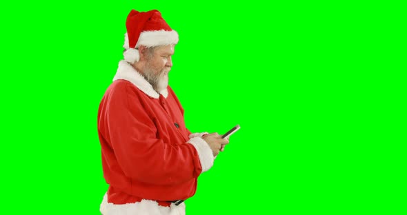 Santa claus using mobile phone 4k