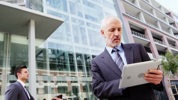 Businessman using digital tablet in the office building