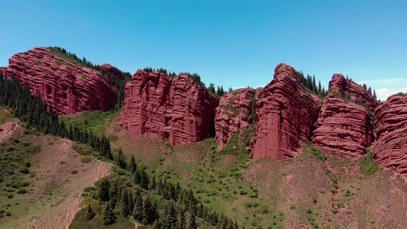 Aerial Slow Close Up on Red Rocks