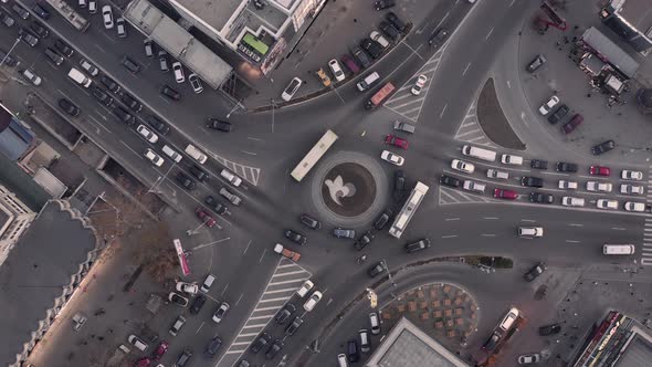 Top Down View of Roundabout Late Evening Overhead Aerial Drone Flight