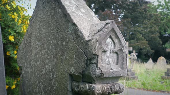 Old Weathered Gravestone Detail In The Churchyard