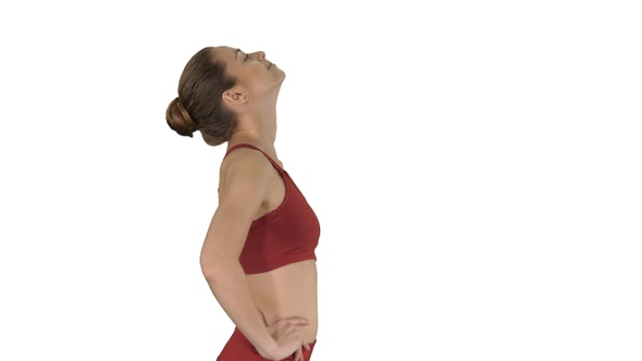 Female walking and doing neck stretching exercise to release