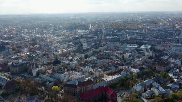 Aerial Drone Video of Lviv Old City Center - Roofs and Streets, City Hall Ratusha