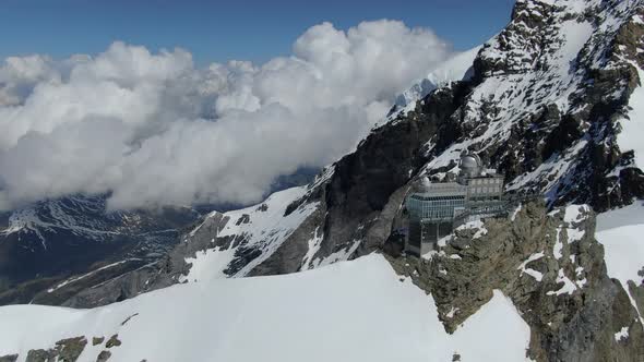 Flying over Sphinx astronomical observatory at Jungfraujoch, Switzerland