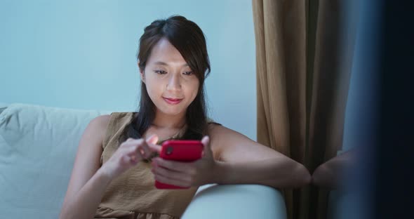 Woman use of smart phone at home