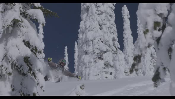 Downhill Skier Spraying Snow At Lens