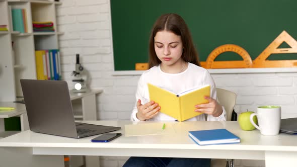Girl Child Got Stressed After Reading Assignment Notebook at School Desk Hometask